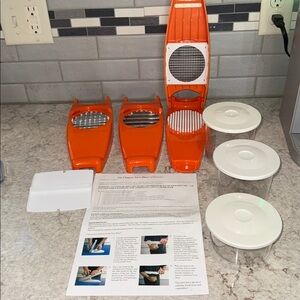 The Ultimate Nicer Dicer by Genius food chopper prep set with bowls lids 3 sizes